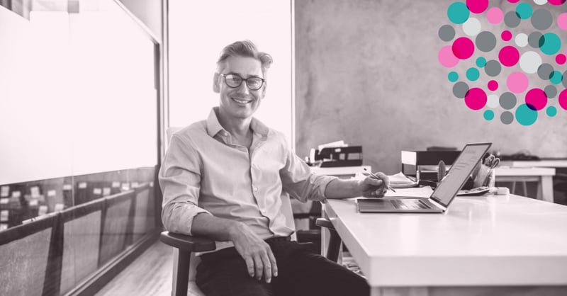 business owner sitting at a desk